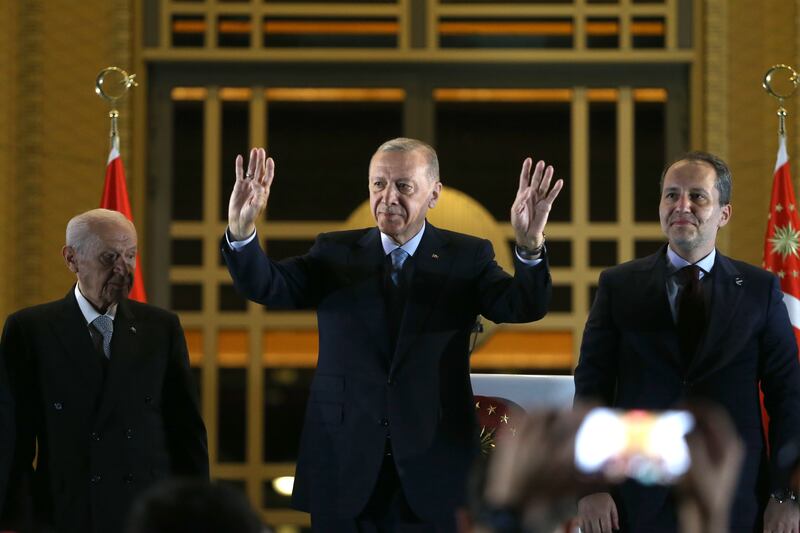 Turkish President Recep Tayyip Erdogan acknowledges supporters in Ankara after winning re-election in a run-off vote. EPA