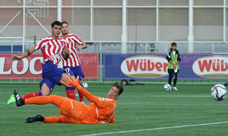 Alvaro Morata of Atletico Madrid scores the opening goal in a friendly against Juventus in Turin on August 7, 2022. EPA