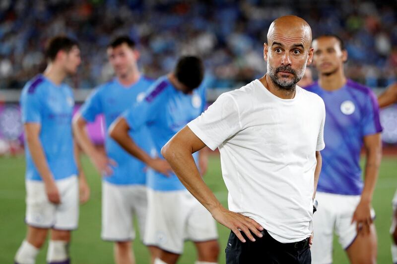 Soccer Football - Pre-Season Friendly - Manchester City v Yokohama F Marinos - Nissan Stadium, Yokohama, Japan - July 27, 2019     Manchester City manager Pep Guardiola at the end of the match    REUTERS/Issei Kato