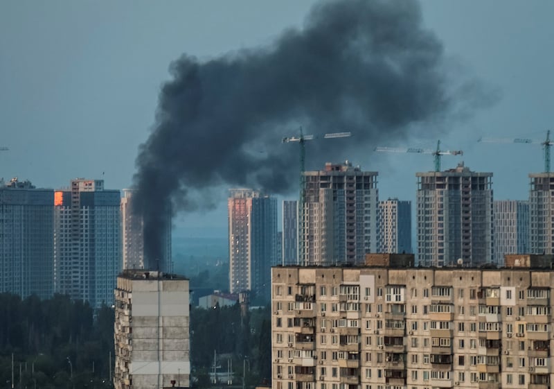 Smoke rises after a Russian missile strike in Kyiv. Reuters