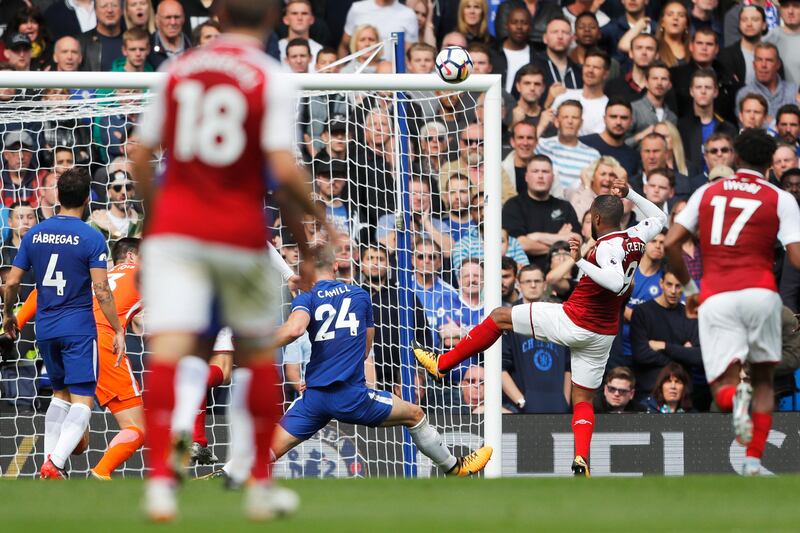 Arsenal's Alexandre Lacazette, second right, misses a chance to score. Frank Augstein / AP Photo