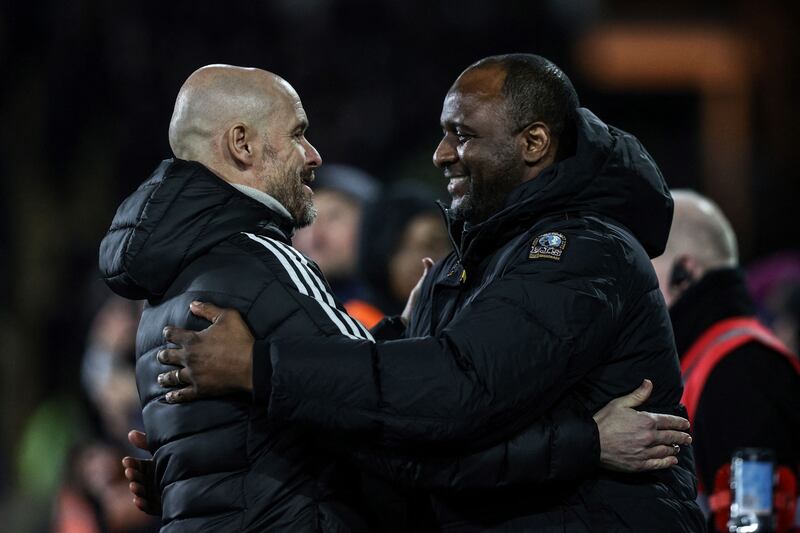 United manager Erik ten Hag and Palace's Patrick Vieira greet each other before the start. AFP