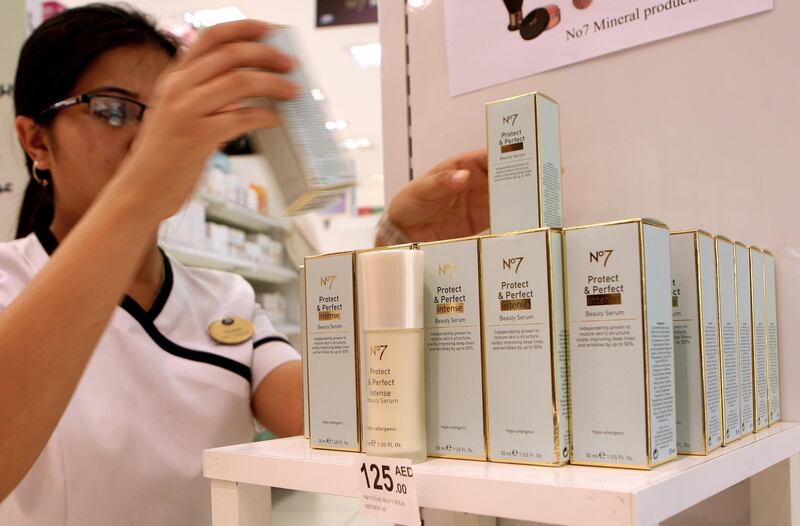 DUBAI - MAY 29,2009 - Store assistant arrange the No 7. Protect and Perfect Intense Beauty serum in the shelf at Boots health and cosmetics shop at IBN Batuta mall. ( Paulo Vecina /The National ) *** Local Caption ***  PV Face Cream 4.jpg