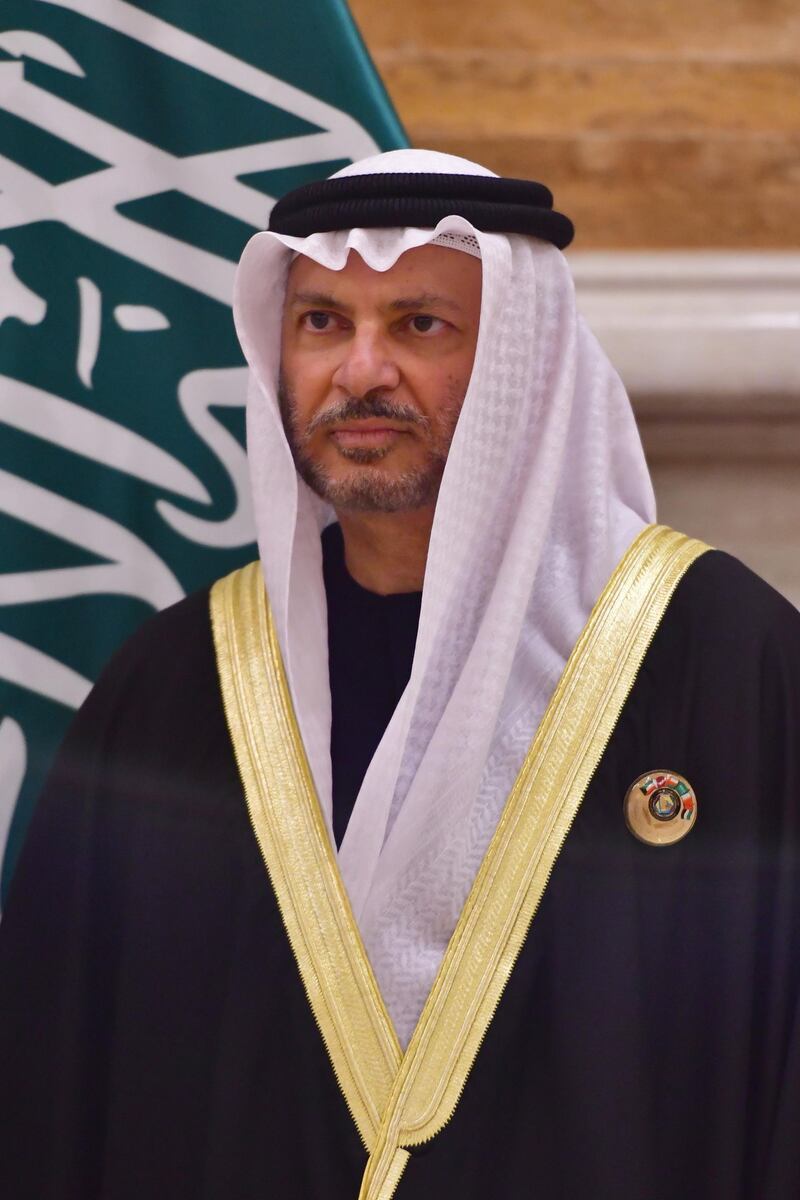 UAE Minister of State for Foreign Affairs Anwar Gargash is seen posing for a family picture at the Gulf Cooperation Council (GCC) at the Bayan palace in Kuwait City on December 5, 2017.
The Gulf Cooperation Council, which launches its annual summit today in Kuwait amid its deepest ever internal crisis, comprises six Arab monarchies who sit on a third of the world's oil. A political and economic union, the GCC comprises Saudi Arabia, the United Arab Emirates, Kuwait, Qatar, Oman and Bahrain. Dominated by Riyadh, it is a major regional counterweight to rival Iran.
 / AFP PHOTO / GIUSEPPE CACACE