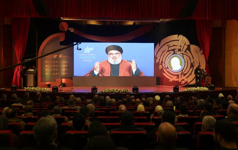 Hezbollah leader Hassan Nasrallah addresses supporters in Beirut via video. Reuters