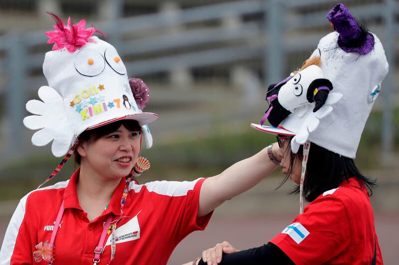 Fans are seen before the first practice round of the Formula One Japanese Grand Prix at the Suzuka circui. Kiyoshi Ota / AFP Photo.