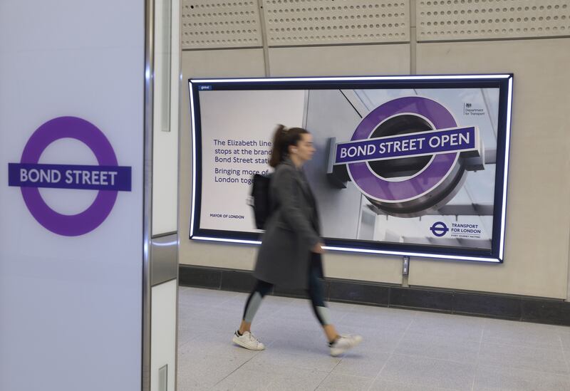 Passengers move between platforms on the opening day of the new Elizabeth Line station at Bond Street in London. Getty Images