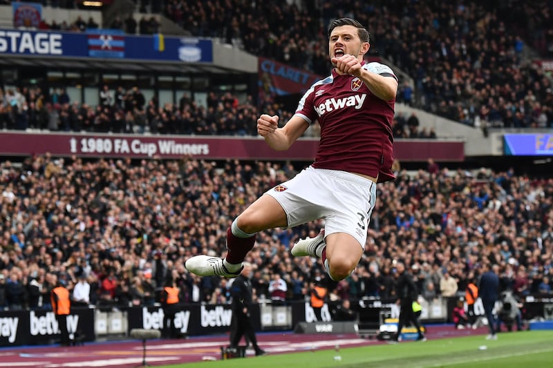 West Ham United's  Aaron Cresswell celebrates after scoring the opening goal in the 2-1 Premier League win against Everton at the London Stadium. AFP