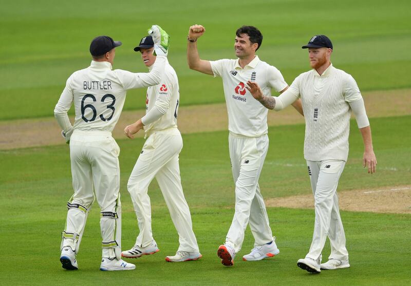 England's James Anderson, second right, celebrates taking the wicket of Pakistan batsman Babar Azam. Reuters