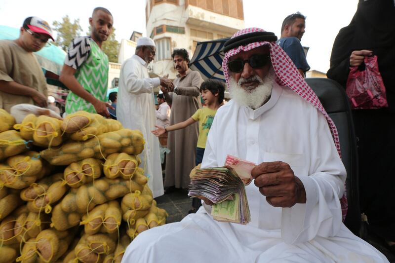 Ali, Saudi Arabia: Ali captures a fantastic image of ‘Uncle Abdullah’, an old vegetable seller counting his money in the Bab Makkah souq in the coastal city of Jeddah. Uncle Abdullah is considered to be one of the oldest merchants in the souq and is revered for keeping traditions alive amid the nation’s globalised advance.