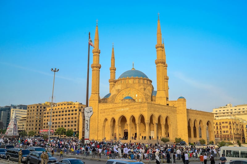 People participate in the Eid al-Fitr prayers outside Al-Amin Mosque in downtown Beirut, Lebanon. EPA