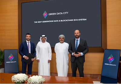 From left, Fadi Dahlan, Phoenix Group chairman; Hisham Malak, chairman of Abu Dhabi Stock Exchange and board member of Phoenix Group; Saeed Al Maawali, Oman's Minister of Transport, Communication and IT; and Olivier Ohnheiser, Green Data City chief executive, during the signing of the agreement. Photo: Green Data City