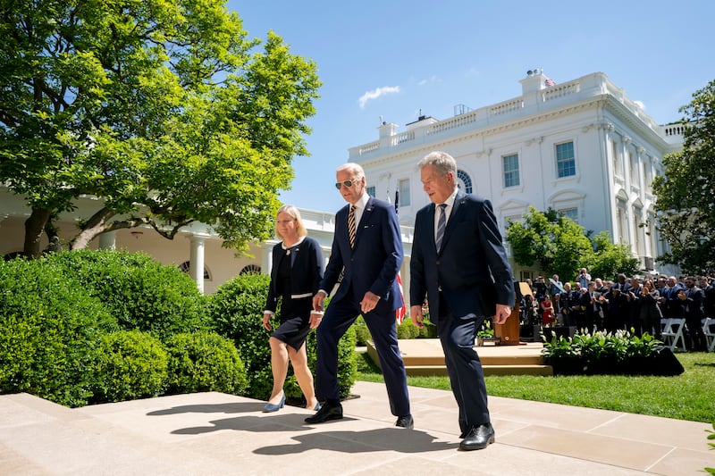 US President Joe Biden, Swedish Prime Minister Magdalena Andersson and Finnish President Sauli Niinisto walk through the White House rose garden after discussing the war, as well as potential Nato membership, in Washington. AP