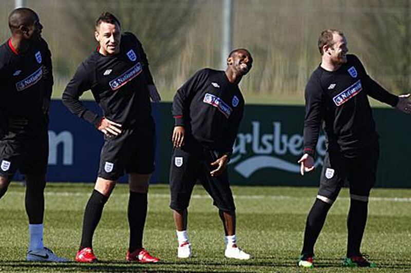 From left, Carlton Cole, John Terry, Shaun Wright-Phillips and Wayne Rooney in training.