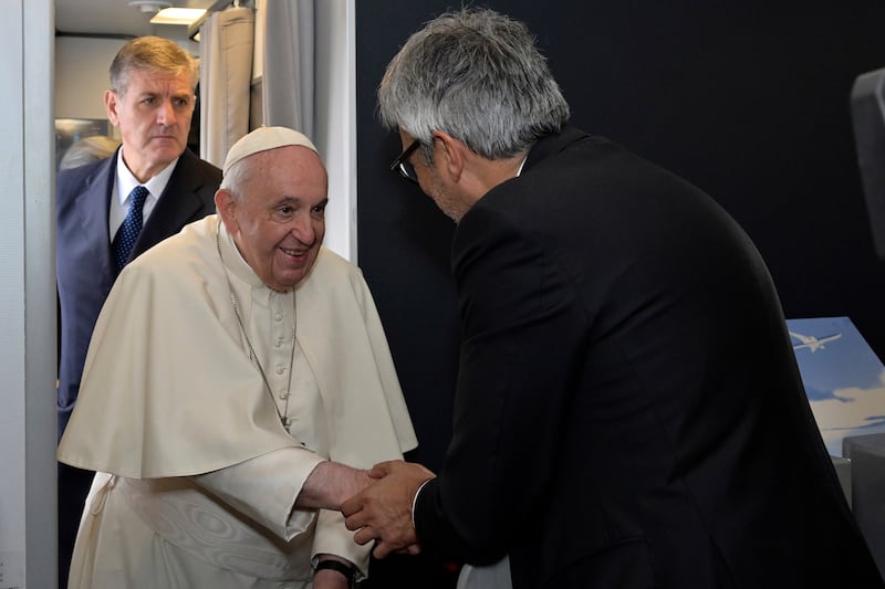 Pope Francis boards a plane at Leonardo da Vinci-Fiumicino Airport on Thursday for his visit to Bahrain. AP