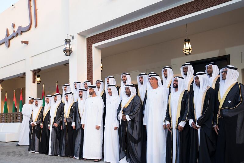 ABU DHABI, UNITED ARAB EMIRATES - November 15, 2018: HH Sheikh Mohamed bin Zayed Al Nahyan, Crown Prince of Abu Dhabi and Deputy Supreme Commander of the UAE Armed Forces (7th L), HE Ahmed Juma Al Zaabi, UAE Deputy Minister of Presidential Affairs (8th L) and HE Jaber Al Suwaidi, General Director of the Crown Prince Court - Abu Dhabi (10th L), stand for a photograph during a mass wedding held at Majlis Al Manhal. 

( Hamad Al Kaabi  / Ministry of Presidential Affairs )
---