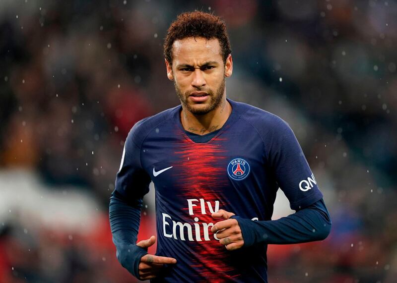 (FILES) In this file photo taken on May 04, 2019 Paris Saint-Germain's Brazilian forward Neymar looks on during the French L1 football match between Paris Saint-Germain (PSG) and OGC Nice at the Parc des Princes stadium in Paris. Neymar is to stay at Paris Saint-Germain after seeing his desire to transfer back to Barcelona fail, according to press reports on September 1, 2019. "Se queda," Spanish for he's staying, read the L'Equipe headline on its front page with a photo of the Brazilian. / AFP / Lionel BONAVENTURE
