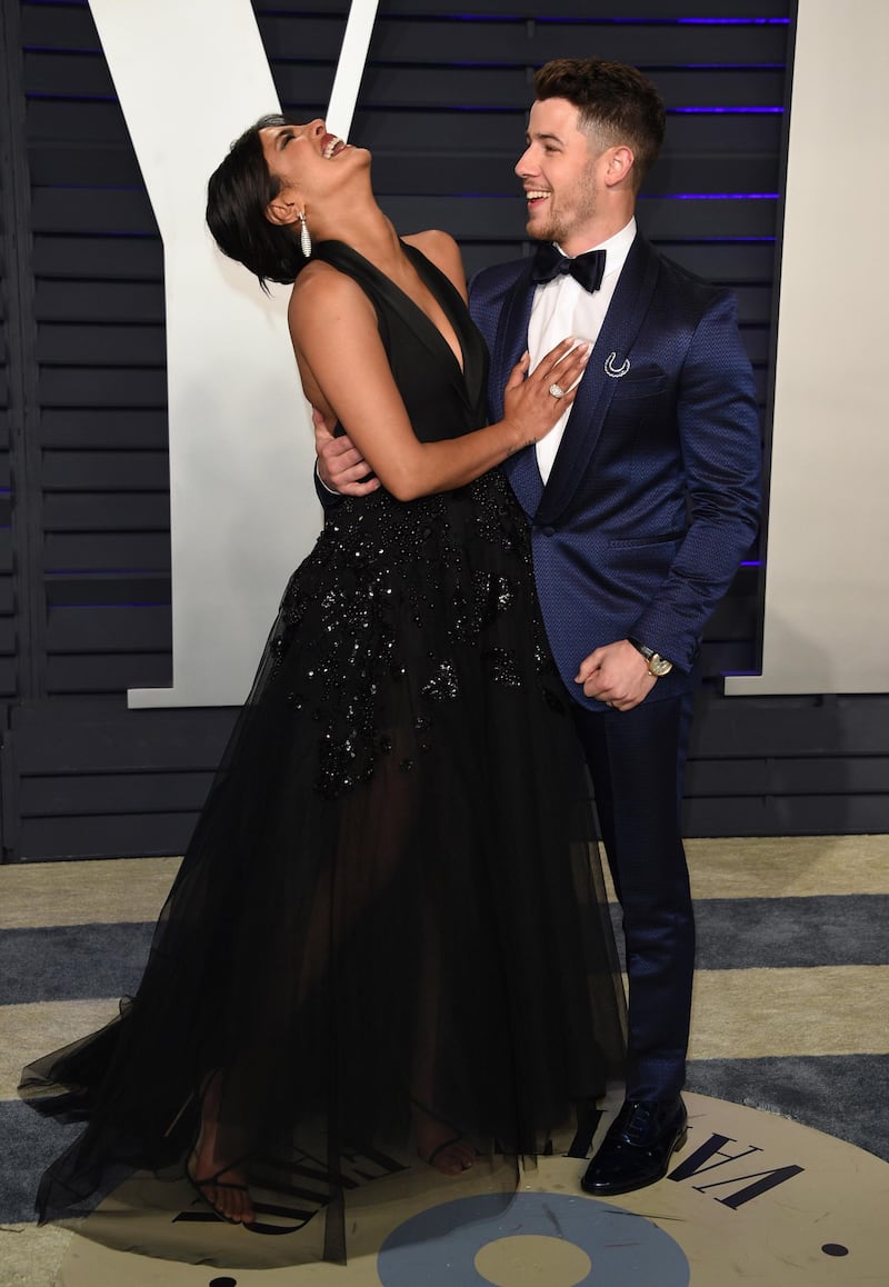 Priyanka Chopra, left, and Nick Jonas arrive at the Vanity Fair Oscar Party on Sunday, Feb. 24, 2019, in Beverly Hills, Calif. (Photo by Evan Agostini/Invision/AP)