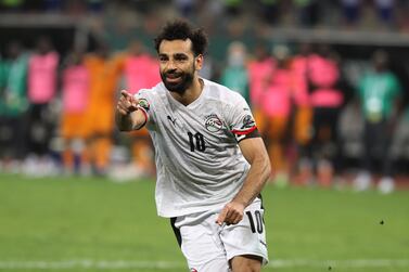 Mohamed Salah of Egypt celebrates after scoring from the penalty spot during the 2021 Africa Cup of Nations AFCON Round of 16 soccer match between Ivory Coast and Egypt at Japoma Stadium, Douala, Cameroon, 26 January 2022.   EPA / Gavin Barker EDITORIAL USE ONLY  EDITORIAL USE ONLY
