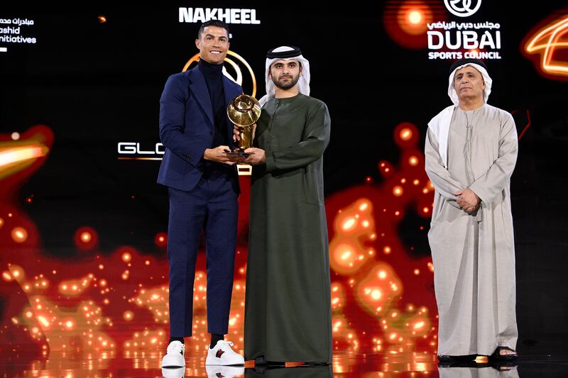 Cristiano Ronaldo  receives the Globe Soccer Maradona Award. AP