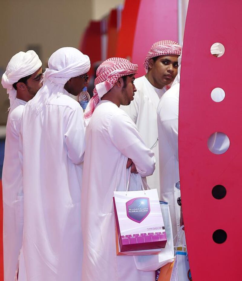 Students attend the Fujairah International Career and Education Fair. Satish Kumar / The National