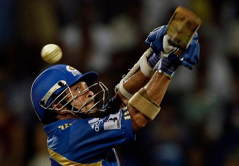 Mumbai Indians' Sachin Tendulkar bats during the Indian Premier League (IPL) cricket match against Kochi Tuskers Kerala in Mumbai, India, Friday, April 15, 2011. (AP Photo/Rajanish Kakade) *** Local Caption ***  DEL186_India_IPL_Cricket.jpg