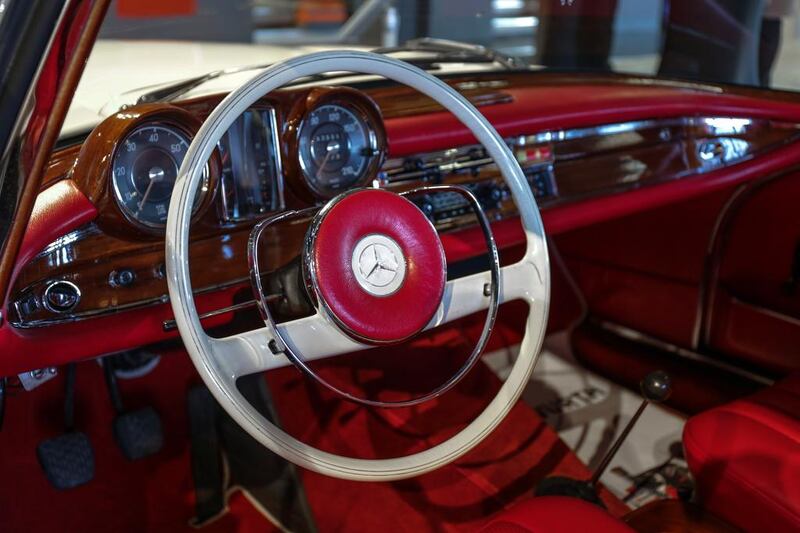 The stylish red interior of a 1961 Mercedes Benz 220SE.
