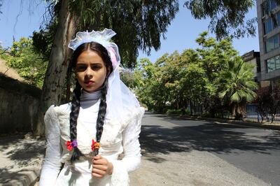 Pictured: 16-year-old Nada Al Ahdal, dressed as a child bride, ran away from home when her parents tried to force her to marry when she was aged 10. The Yemeni activist spoke at an event in Amman last month aimed at highlighting the issue of child marriage in Jordan. Photo supplied by Nada Al Ahdal.