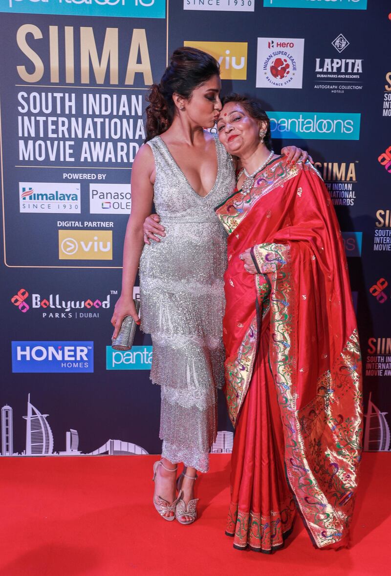 Dubai, United Arab Emirates, September 15, 2018.  SIIMA Day 2 Red Carpet. --- Shriya Saran kisses her mother Neerja.
Victor Besa/The National
Section:  AC
Reporter:  Felicity Campbell