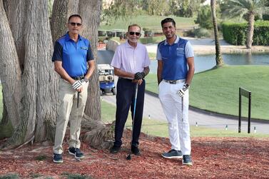 Habib Yusufali (grandfather), Muzzafar Yusufali (father) and Shane Yusufali (son) at the Emirates Golf Club in Dubai. Pawan Singh / The National