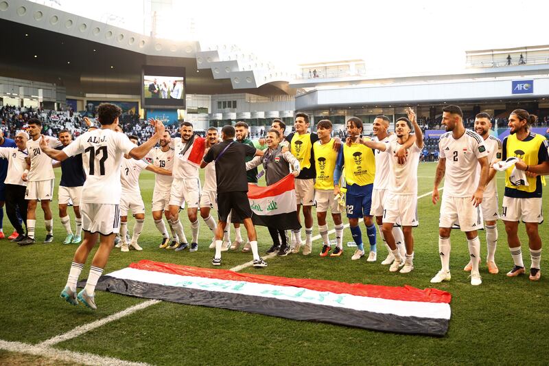 Iraq players celebrate after the team's victory over Vietnam. Getty Images
