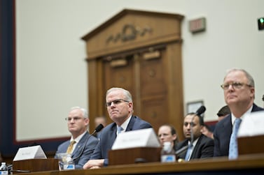 Robert Sumwalt, chairman of the National Transportation Safety Board (NTSB), from right, Daniel Elwell, acting administrator of the Federal Aviation Administration (FAA), and Earl Lawrence, executive director of aircraft certification with the Federal Aviation Administration (FAA), listen during a House Aviation Subcommittee hearing on the status of Boeing Co.'s 737 Max in Washington, D.C., U.S., on Wednesday, May 15, 2019. U.S. aviation regulators were directly involved in approving the flight-control system implicated in two fatal crashes on Boeing's 737 Max, a top administration official told Congress today, pushing back on complaints that the company had too much of a role overseeing itself. Photographer: Andrew Harrer/Bloomberg
