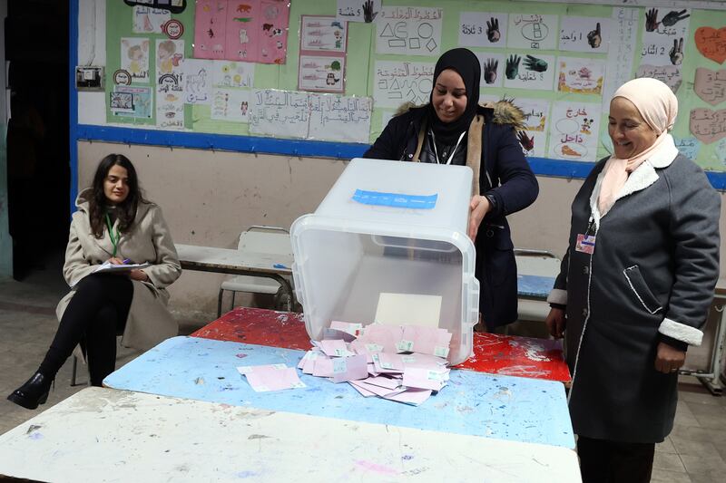 Officials at a polling station in Tunis count votes in the second round of parliamentary elections on Sunday. The nation embraced the idea of multiparty democracy in 2011 but voter turnout has fallen to new lows. EPA