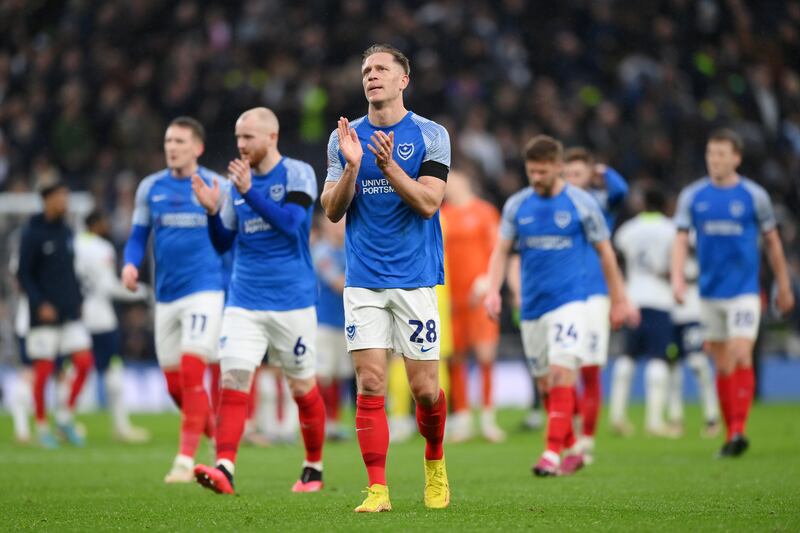 Michael Morrison of Portsmouth acknowledges the fans. Getty