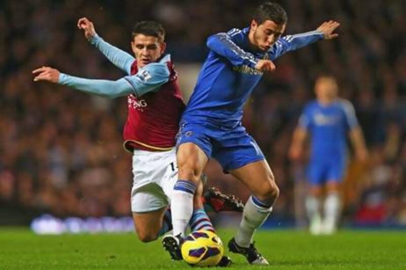 LONDON, ENGLAND - DECEMBER 23: Ashley Westwood of Aston Villa battles with Eden Hazard of Chelsea during the Barclays Premier League match between Chelsea and Aston Villa at Stamford Bridge on December 23, 2012 in London, England. (Photo by Clive Rose/Getty Images) *** Local Caption *** 158673427.jpg