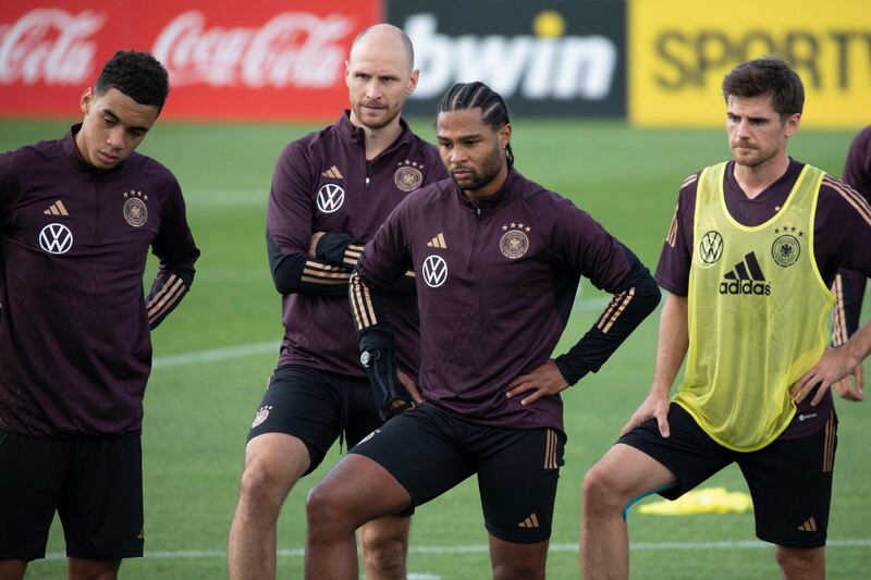 Germany forward Serge Gnabry, centre, looks on during a training session. AFP