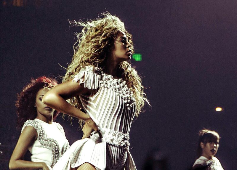 IMAGE DISTRIBUTED FOR PARKWOOD ENTERTAINMENT - Singer Beyonce performs on her "Mrs. Carter Show World Tour 2013", on Saturday, July 13, 2013 at the Bridgestone Arena in Nashville, Tenn.(Photo by Robin Harper/Invision for Parkwood Entertainment/AP Images) *** Local Caption ***  Beyonce - Mrs Carter World Tour - Nashville.JPEG-0aafb.jpg