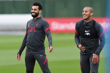 LIVERPOOL, ENGLAND - OCTOBER 13: (THE SUN OUT. THE SUN ON SUNDAY OUT) Mohamed Salah of Liverpool with Thiago Alcantara of Liverpoolduring a training session at Melwood Training Ground on October 13, 2020 in Liverpool, England. (Photo by John Powell/Liverpool FC via Getty Images)