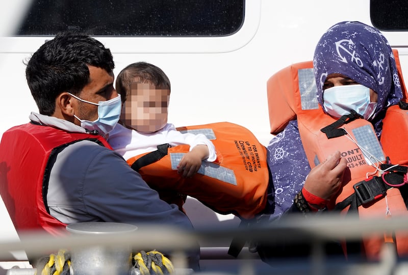 Migrants are taken ashore to Dover, Kent, on a Border Force vessel after being pulled from the English Channel on September 4. PA