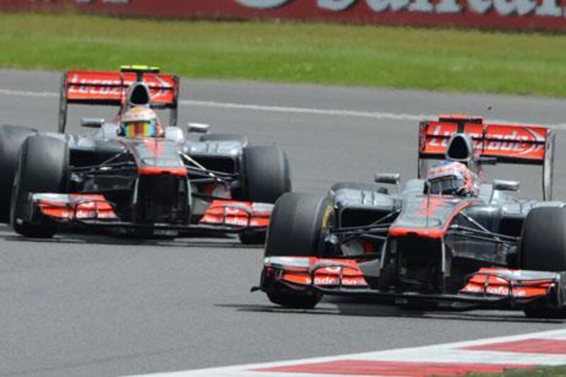 Jenson Button leads Lewis Hamilton out of Club during the 2012 British Grand Prix at Silverstone