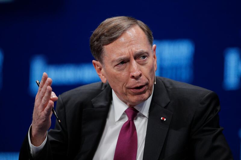 FILE - In this Monday, April 30, 2018 file photo, former CIA director retired Gen. David PetraeusÂ speaks during a discussion at the Milken Institute Global Conference  in Beverly Hills, Calif. Writing Friday Oct. 19, 2018 in the Times of London, the former commander of American forces in Iraq and Afghanistan said the United States' military cooperation with the U.K. could be threatened by the growing use of human rights laws to target British soldiers. (AP Photo/Jae C. Hong, File)