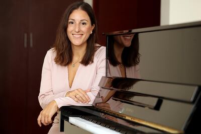 Former cabin crew Mercedes Basutto was made redundant and has now switched careers as a piano teacher in Dubai on June 22nd, 2021. Chris Whiteoak / The National. 
Reporter: N/A for News