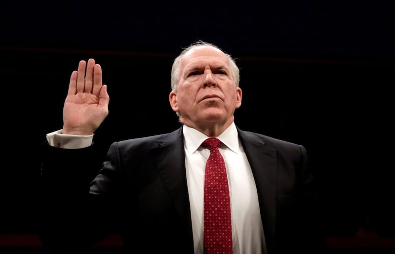 FILE PHOTO: Former CIA director John Brennan is sworn in to testify before the House Intelligence Committee to take questions on "Russian active measures during the 2016 election campaign" on Capitol Hill in Washington, U.S., May 23, 2017.  REUTERS/Kevin Lamarque/File Photo