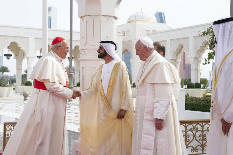 ABU DHABI, UNITED ARAB EMIRATES - February 04, 2019: Day two of the UAE papal visit - HH Sheikh Mohamed bin Rashid Al Maktoum, Vice-President, Prime Minister of the UAE, Ruler of Dubai and Minister of Defence (3rd R) greets a member of the Vatican delegation, during a reception for His Holiness Pope Francis, Head of the Catholic Church (2nd R), at the Presidential Palace. Seen with HH Sheikh Mohamed bin Zayed Al Nahyan, Crown Prince of Abu Dhabi and Deputy Supreme Commander of the UAE Armed Forces (R).
( Mohamed Al Hammadi / Ministry of Presidential Affairs )
---