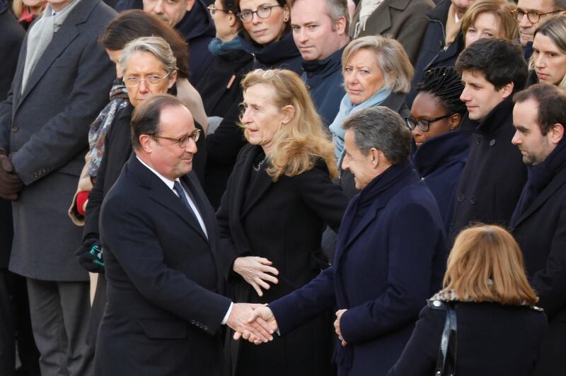 Former French Presidents Francois Hollande and Nicolas Sarkozy attend the ceremony. Reuters