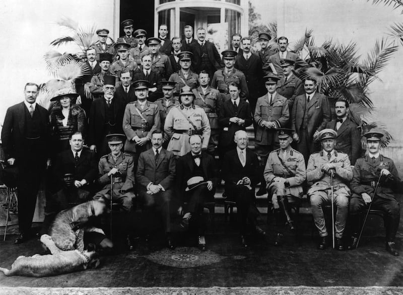 1921:  Members of the Mesopotamia Commission, set up to discuss the future of Mesopotamia at the Cairo Conference. Included in the photograph are Gertrude Bell (second from left, second row), T E Lawrence (fourth from the right, second row),Herbert Samuel, 1st Viscount Samuel (left of Churchill) and Winston Churchill (centre front row).  (Photo by General Photographic Agency/Getty Images)