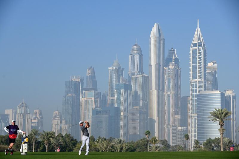 England's Paul Casey of England plays his second shot on the thirteenth. Getty