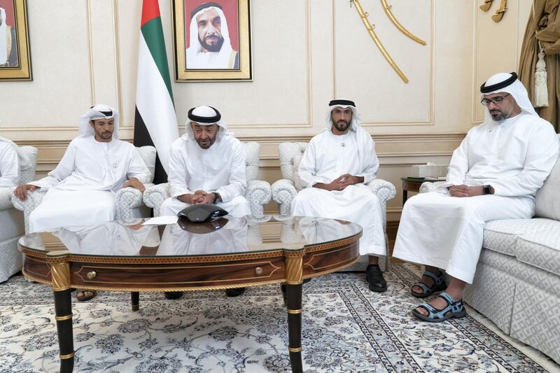 ABU DHABI, UNITED ARAB EMIRATES - September 23, 2019: HH Sheikh Mohamed bin Zayed Al Nahyan, Crown Prince of Abu Dhabi and Deputy Supreme Commander of the UAE Armed Forces (3rd R), speaks over the phone to Astronaut Major Hazza Al Mansouri who will launch into space on September 25th and Dr Sultan Al Neyadi, a member of the mission’s back-up crew, at the Sea Palace. Seen with HH Sheikh Nahyan Bin Zayed Al Nahyan, Chairman of the Board of Trustees of Zayed bin Sultan Al Nahyan Charitable and Humanitarian Foundation (2nd R) and HH Major General Sheikh Khaled bin Mohamed bin Zayed Al Nahyan, Deputy National Security Adviser (R).

( Rashed Al Mansoori / Ministry of Presidential Affairs )
---