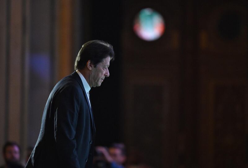 A picture taken October 23, 2018 shows Pakistani Prime Minister Imran Khan as he arrives to attend the opening ceremony of the Future Investment Initiative FII conference taking place in Riyadh from 23-25 October. Saudi Arabia is hosting a key investment summit overshadowed by the killing of critic Jamal Khashoggi that has prompted a wave of policymakers and corporate giants to withdraw. / AFP / FAYEZ NURELDINE
