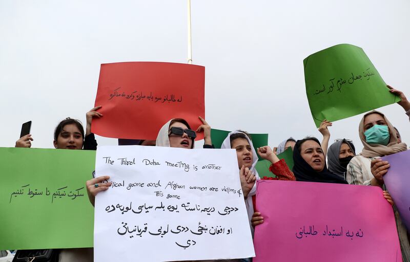 Supporters of Afghan women hold a protest in Islamabad, Pakistan on June 10. A third round of UN-led talks on Afghanistan’s future ended in Doha yesterday but female Afghans were not allowed to take part. EPA